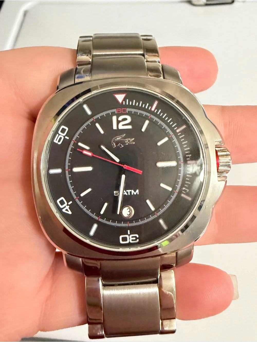 Lacoste Silver Stainless Steel Watch with Black Dial and Red Accents